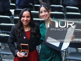 Katia Itzel Garcia, a soccer referee, poses after receiving a prize during the National Sports Award 2024 at the National Palace in Mexico C...