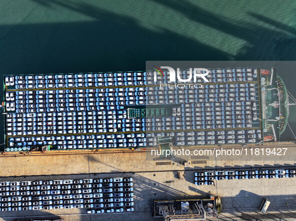 A large number of vehicles are ready to be shipped for export at the port of Lianyungang in Jiangsu province, China, on November 29, 2024. 