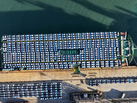 A large number of vehicles are ready to be shipped for export at the port of Lianyungang in Jiangsu province, China, on November 29, 2024. (