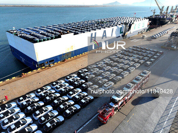 A large number of vehicles are ready to be shipped for export at the port of Lianyungang in Jiangsu province, China, on November 29, 2024. 