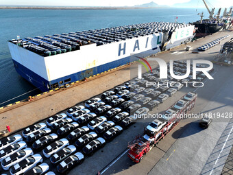 A large number of vehicles are ready to be shipped for export at the port of Lianyungang in Jiangsu province, China, on November 29, 2024. (