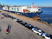 A large number of vehicles are ready to be shipped for export at the port of Lianyungang in Jiangsu province, China, on November 29, 2024. (