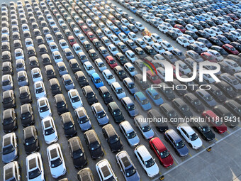 A large number of vehicles are ready to be shipped for export at the port of Lianyungang in Jiangsu province, China, on November 29, 2024. (