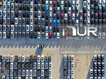 A large number of vehicles are ready to be shipped for export at the port of Lianyungang in Jiangsu province, China, on November 29, 2024. (