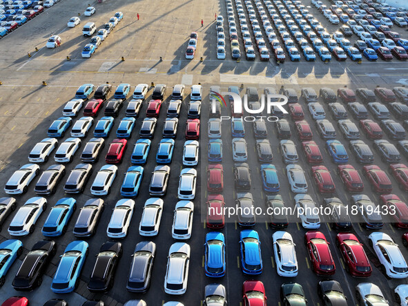 A large number of vehicles are ready to be shipped for export at the port of Lianyungang in Jiangsu province, China, on November 29, 2024. 