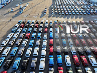 A large number of vehicles are ready to be shipped for export at the port of Lianyungang in Jiangsu province, China, on November 29, 2024. (