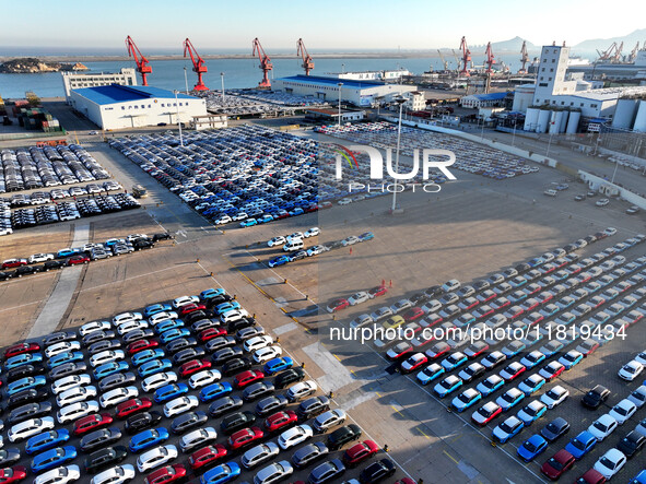 A large number of vehicles are ready to be shipped for export at the port of Lianyungang in Jiangsu province, China, on November 29, 2024. 