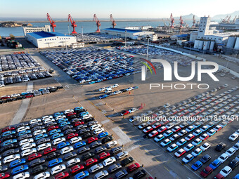 A large number of vehicles are ready to be shipped for export at the port of Lianyungang in Jiangsu province, China, on November 29, 2024. (