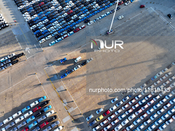 A large number of vehicles are ready to be shipped for export at the port of Lianyungang in Jiangsu province, China, on November 29, 2024. 