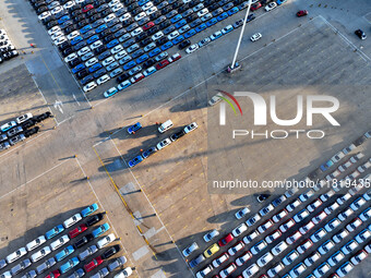 A large number of vehicles are ready to be shipped for export at the port of Lianyungang in Jiangsu province, China, on November 29, 2024. (