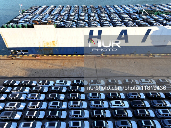 A large number of vehicles are ready to be shipped for export at the port of Lianyungang in Jiangsu province, China, on November 29, 2024. 