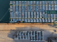 A large number of vehicles are ready to be shipped for export at the port of Lianyungang in Jiangsu province, China, on November 29, 2024. (