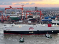 The car carrier ''BYD Changzhou'' departs with the assistance of a tugboat at CIMC Raffles' Shandong Longkou construction base in Yantai, Ch...