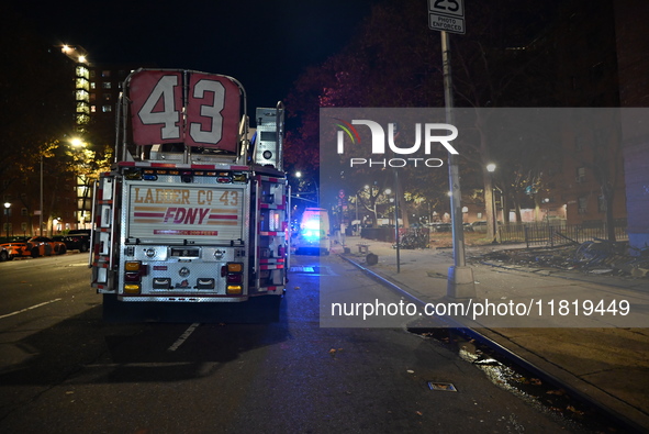 An FDNY fire truck is involved in a crash, leaving a trail of destruction through East Harlem, Manhattan, New York, United States, on Novemb...