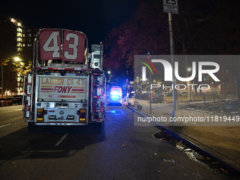 An FDNY fire truck is involved in a crash, leaving a trail of destruction through East Harlem, Manhattan, New York, United States, on Novemb...