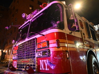 An FDNY fire truck is involved in a crash, leaving a trail of destruction through East Harlem, Manhattan, New York, United States, on Novemb...