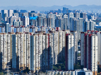 Densely packed residential buildings are seen in Nanjing, China, on November 29, 2024. (