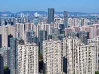 Densely packed residential buildings are seen in Nanjing, China, on November 29, 2024. (