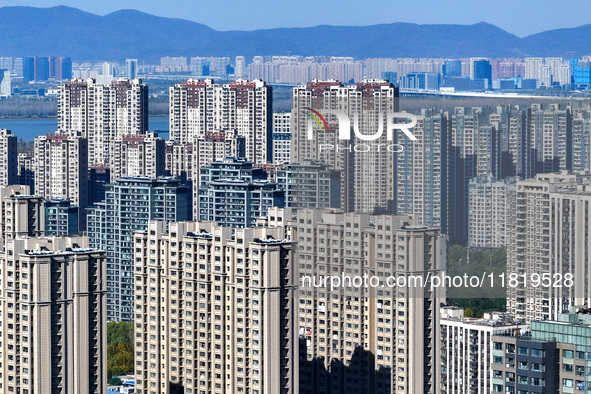 Densely packed residential buildings are seen in Nanjing, China, on November 29, 2024. 