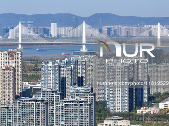 Densely packed residential buildings are seen in Nanjing, China, on November 29, 2024. (