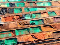 Imported iron ore is piled up at an iron ore yard in Qingdao Port in Qingdao, China, on November 29, 2024. (