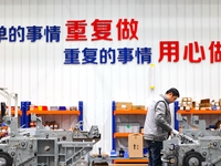 Workers produce shuttleless looms at a workshop in the West Coast New Area of Qingdao, Shandong province, China, on November 28, 2024. (