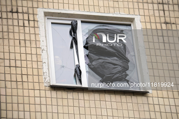 A window in an apartment block in the Dniprovskyi district is broken by an overnight Russian drone attack in Kyiv, Ukraine, on November 29,...