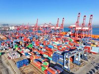 The photo shows the working scene of a container terminal at Lianyungang Port in Jiangsu province, China, on November 29, 2024. (