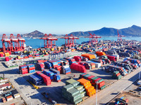 The photo shows the working scene of a container terminal at Lianyungang Port in Jiangsu province, China, on November 29, 2024. (