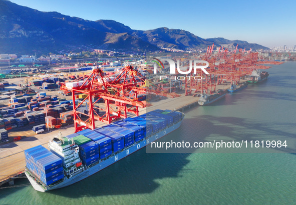 The photo shows the working scene of a container terminal at Lianyungang Port in Jiangsu province, China, on November 29, 2024. 