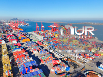 The photo shows the working scene of a container terminal at Lianyungang Port in Jiangsu province, China, on November 29, 2024. (