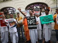 Monks of ISKCON (International Society of Krishna Consciousness) and Hindu devotees in Kolkata, India, hold a protest against the recent arr...