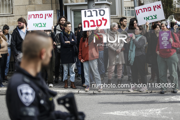 In Jerusalem, Israel, on November 29, 2024, Israeli police try to prevent demonstrators from marching as a group of Israeli demonstrators ca...