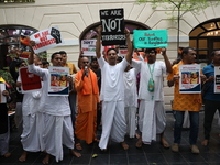 Monks of ISKCON (International Society of Krishna Consciousness) and Hindu devotees in Kolkata, India, hold a protest against the recent arr...