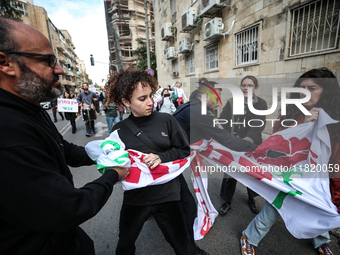 In Jerusalem, Israel, on November 29, 2024, Israeli police try to prevent demonstrators from marching as a group of Israeli demonstrators ca...