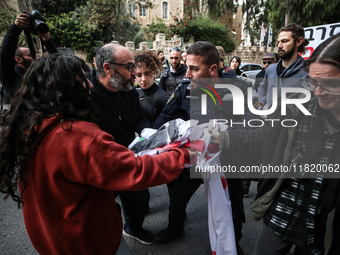 In Jerusalem, Israel, on November 29, 2024, Israeli police try to prevent demonstrators from marching as a group of Israeli demonstrators ca...