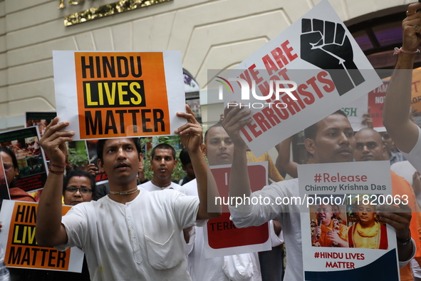 Monks of ISKCON (International Society of Krishna Consciousness) and Hindu devotees in Kolkata, India, hold a protest against the recent arr...