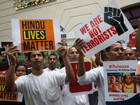 Monks of ISKCON (International Society of Krishna Consciousness) and Hindu devotees in Kolkata, India, hold a protest against the recent arr...