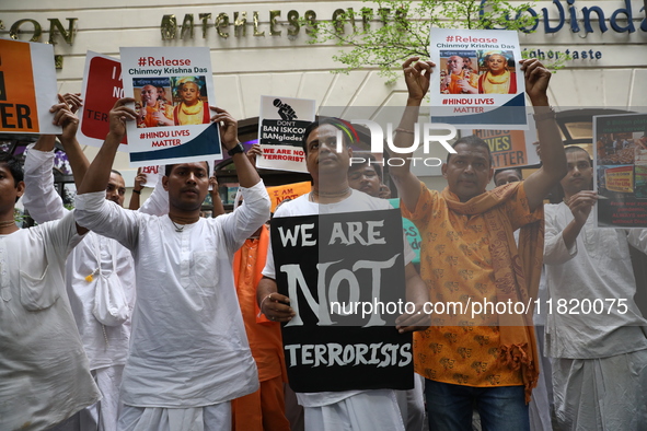 Monks of ISKCON (International Society of Krishna Consciousness) and Hindu devotees in Kolkata, India, hold a protest against the recent arr...