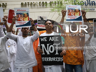 Monks of ISKCON (International Society of Krishna Consciousness) and Hindu devotees in Kolkata, India, hold a protest against the recent arr...