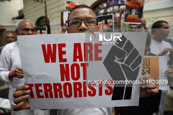 Monks of ISKCON (International Society of Krishna Consciousness) and Hindu devotees in Kolkata, India, hold a protest against the recent arr...