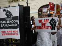 Monks of ISKCON (International Society of Krishna Consciousness) and Hindu devotees in Kolkata, India, hold a protest against the recent arr...