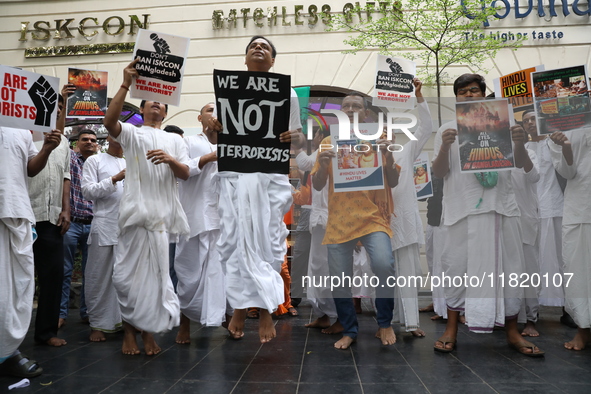 Monks of ISKCON (International Society of Krishna Consciousness) and Hindu devotees in Kolkata, India, hold a protest against the recent arr...