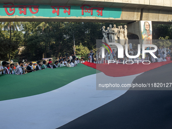 Students of Dhaka University organize a ''March for Palestine'' in Dhaka, Bangladesh, on November 29, 2024, to mark the International Day of...