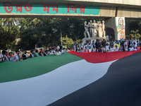 Students of Dhaka University organize a ''March for Palestine'' in Dhaka, Bangladesh, on November 29, 2024, to mark the International Day of...