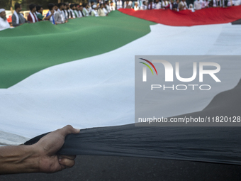 Students of Dhaka University organize a ''March for Palestine'' in Dhaka, Bangladesh, on November 29, 2024, to mark the International Day of...