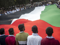 Students of Dhaka University organize a ''March for Palestine'' in Dhaka, Bangladesh, on November 29, 2024, to mark the International Day of...