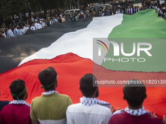 Students of Dhaka University organize a ''March for Palestine'' in Dhaka, Bangladesh, on November 29, 2024, to mark the International Day of...