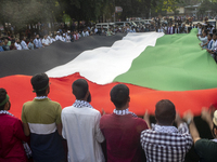 Students of Dhaka University organize a ''March for Palestine'' in Dhaka, Bangladesh, on November 29, 2024, to mark the International Day of...