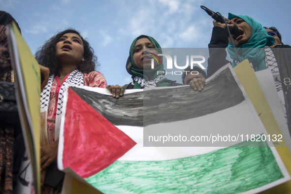 Students of Dhaka University organize a ''March for Palestine'' in Dhaka, Bangladesh, on November 29, 2024, to mark the International Day of...